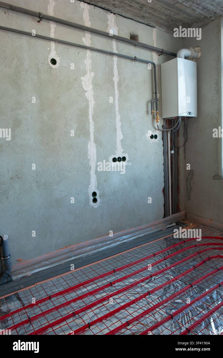 Underfloor surface heating pipes. Low temperature heating concept Stock Photo