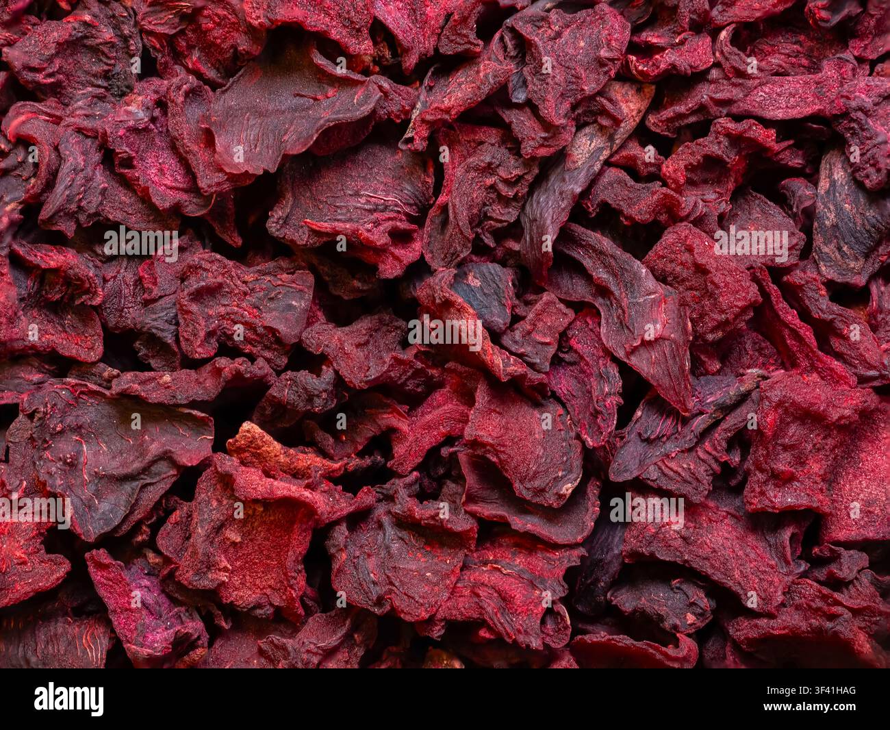 Beetroot Chips on White Plate. Color red Background Stock Photo