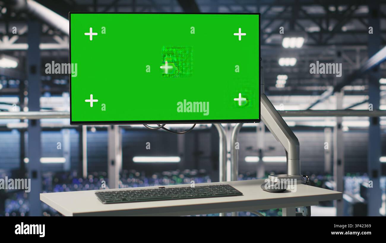 Server hub green screen computer monitoring systems processing deep learning datasets for AI workflows. PC chroma key displays tracking hardware supporting artificial intelligence model development Stock Photo