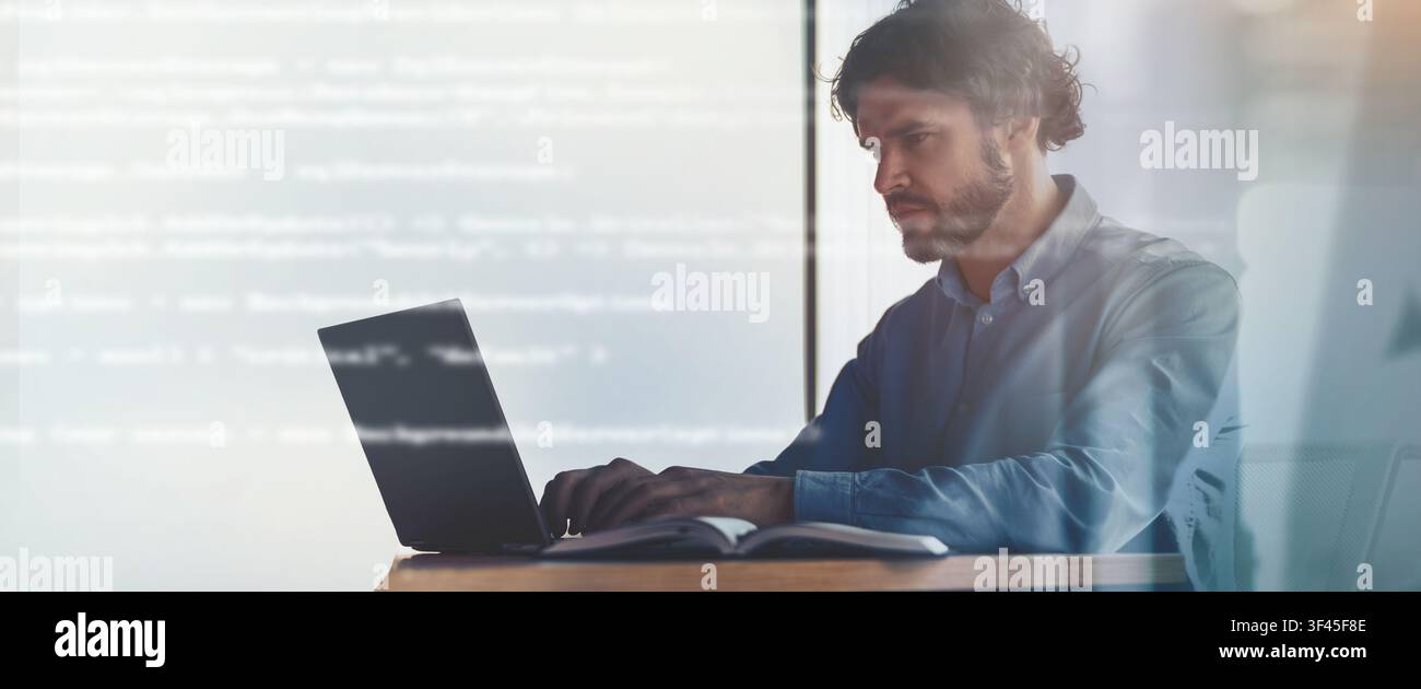 Focused Caucasian Male Developer Coding On Laptop In Modern Office Space, Business Concept Stock Photo