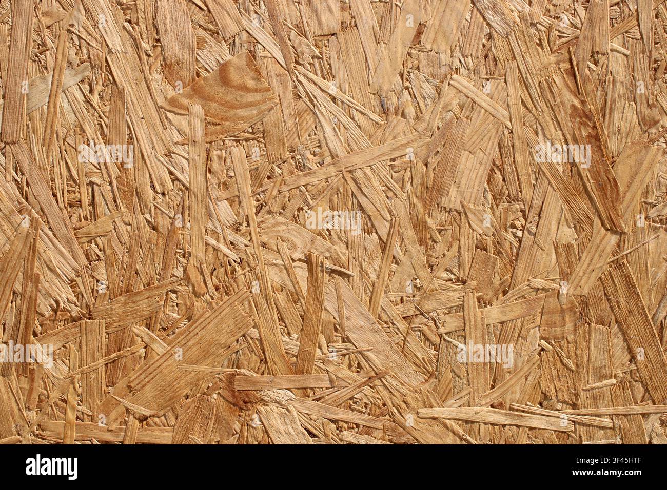 Pressed OSB oriented strand board wooden texture background surface Stock Photo