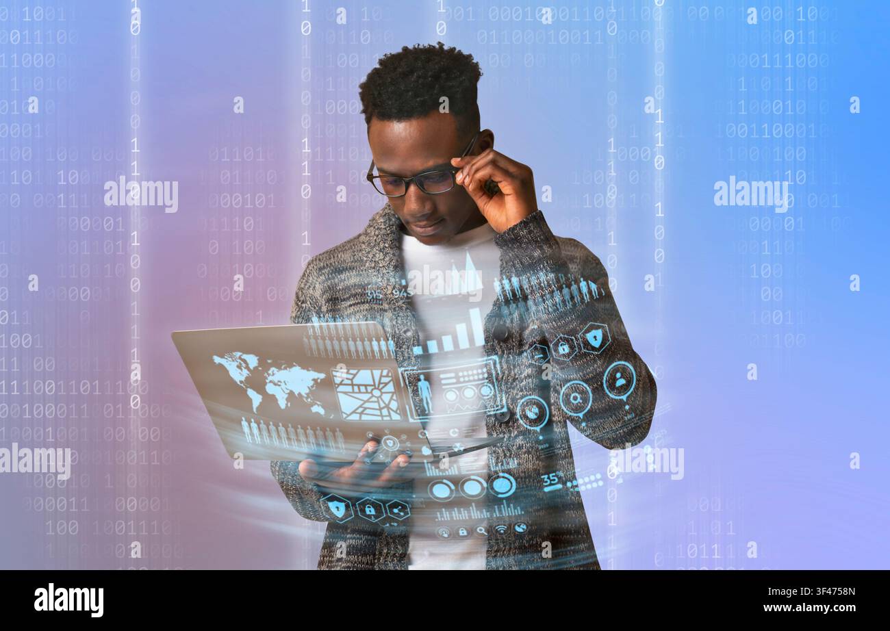 Black man using laptop, cyber security concept Stock Photo