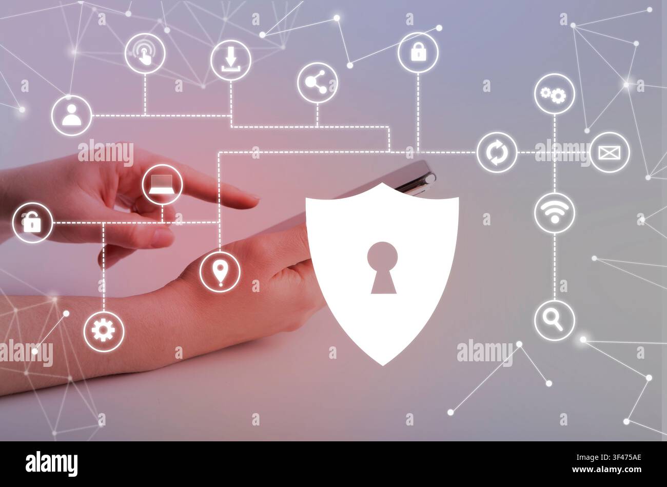 Woman holding phone with virtual security shield Stock Photo