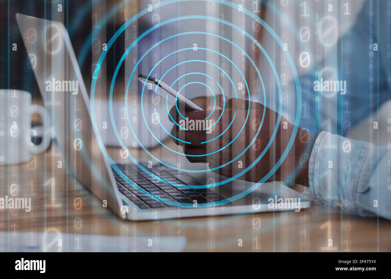 Mobile Security Concept. Black man using phone and laptop Stock Photo