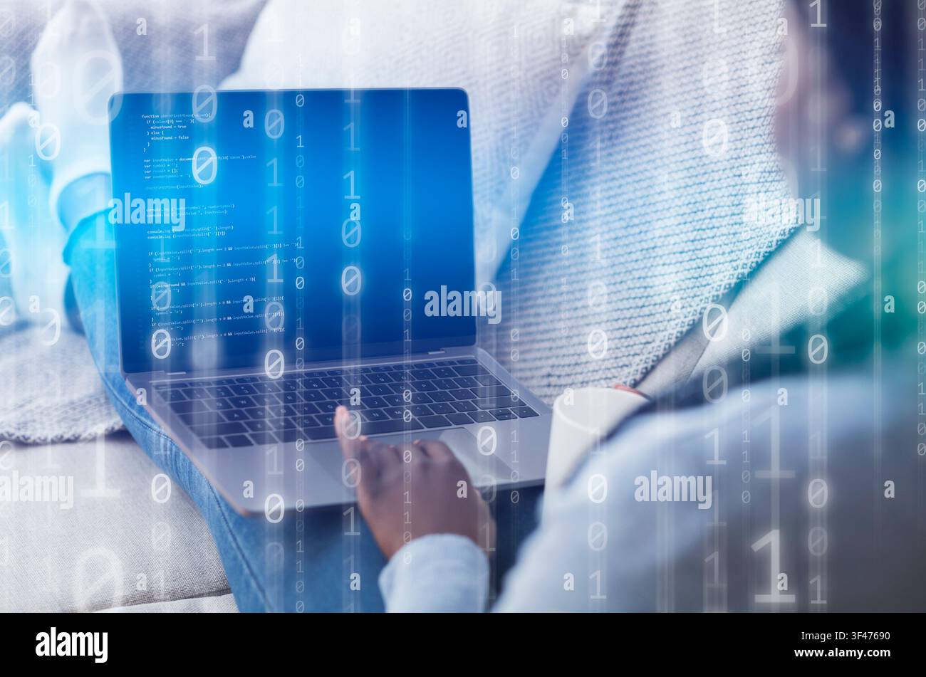 Security Concept. Black woman using laptop writing code Stock Photo