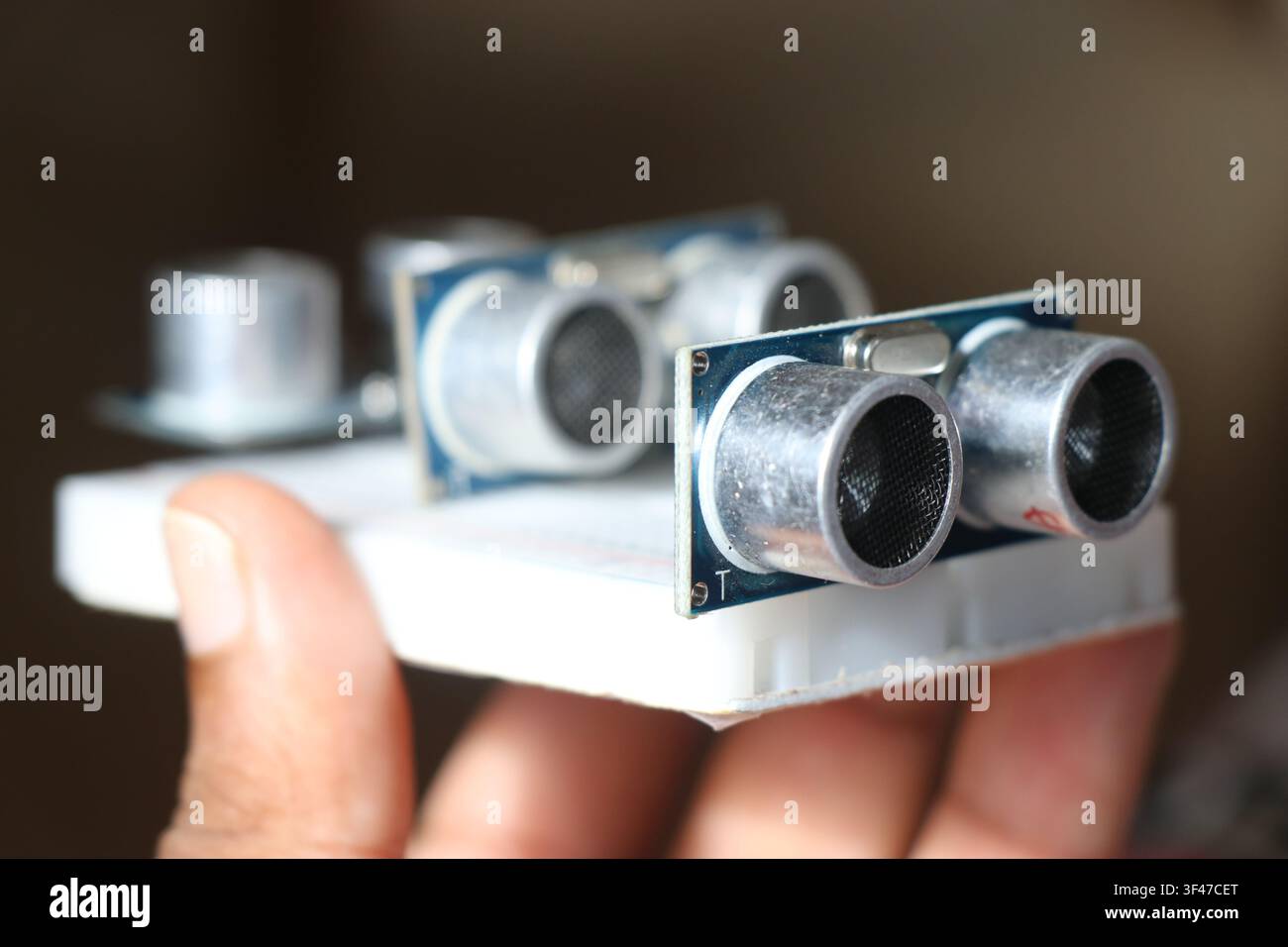 Ultrasonic sensor or the hcsr04 module connected on the breadboard Stock Photo