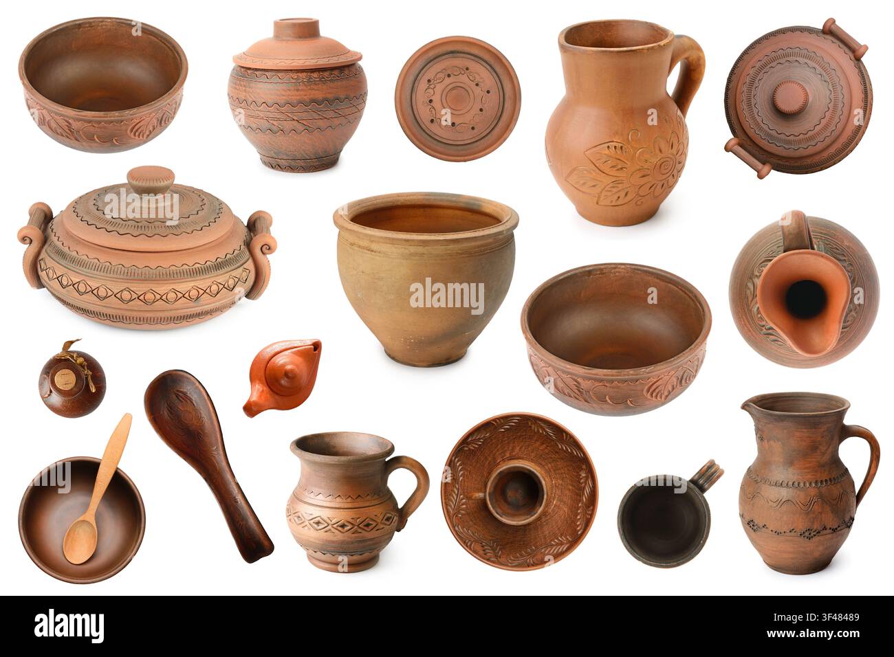 Various clay dishes from different angles isolated on white background. Stock Photo