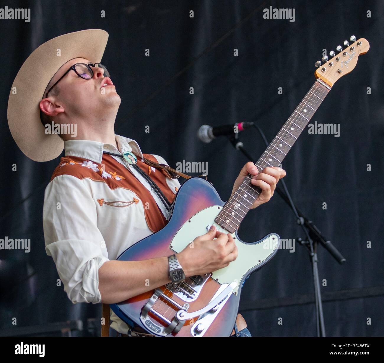 Dom Glynn and his Sunday Best on the main stage at the 19th Maverick long weekend Americana music festival held in Easton Farm Park in rural Suffolk. Stock Photo