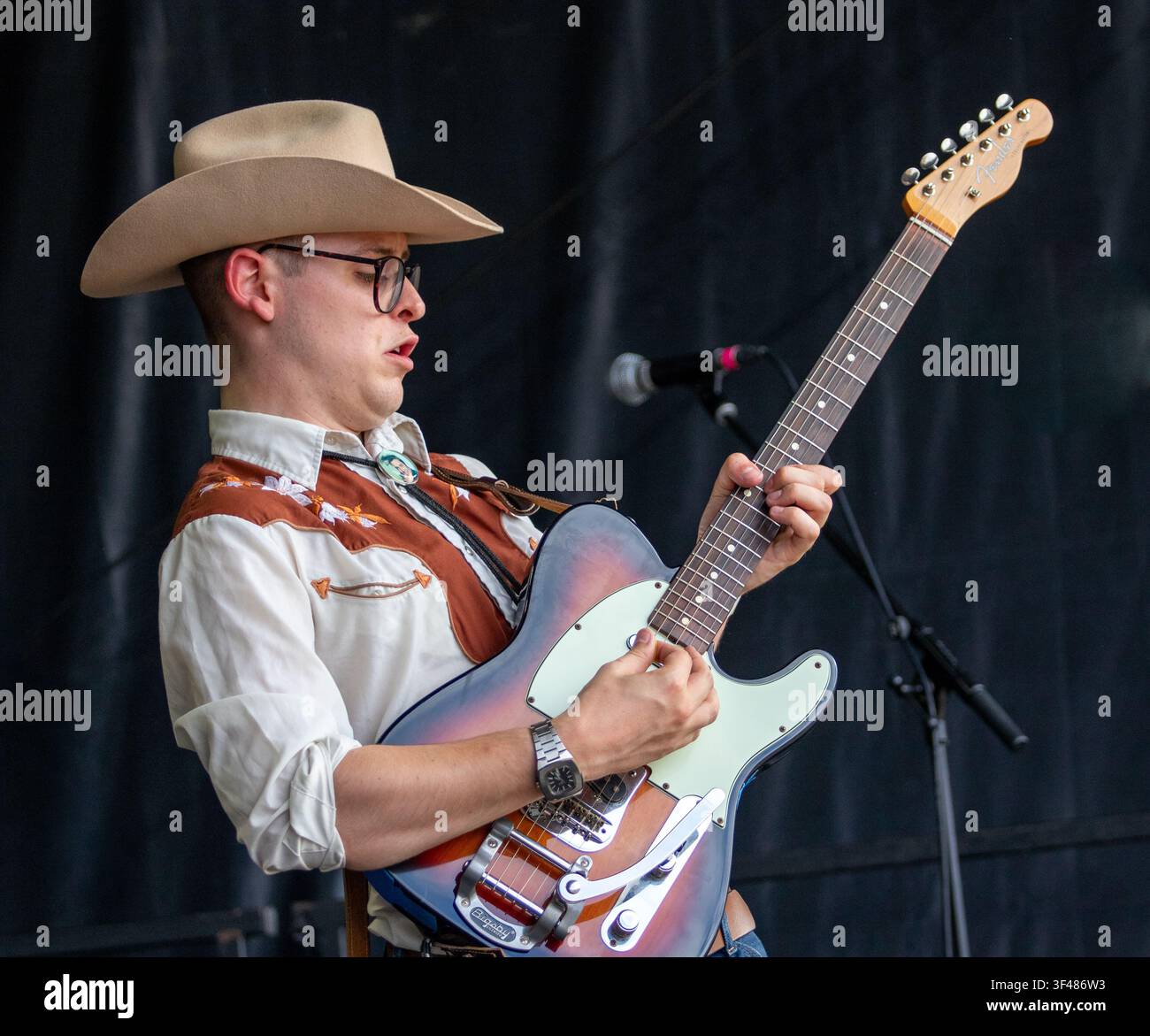 Dom Glynn and his Sunday Best on the main stage at the 19th Maverick long weekend Americana music festival held in Easton Farm Park in rural Suffolk. Stock Photo