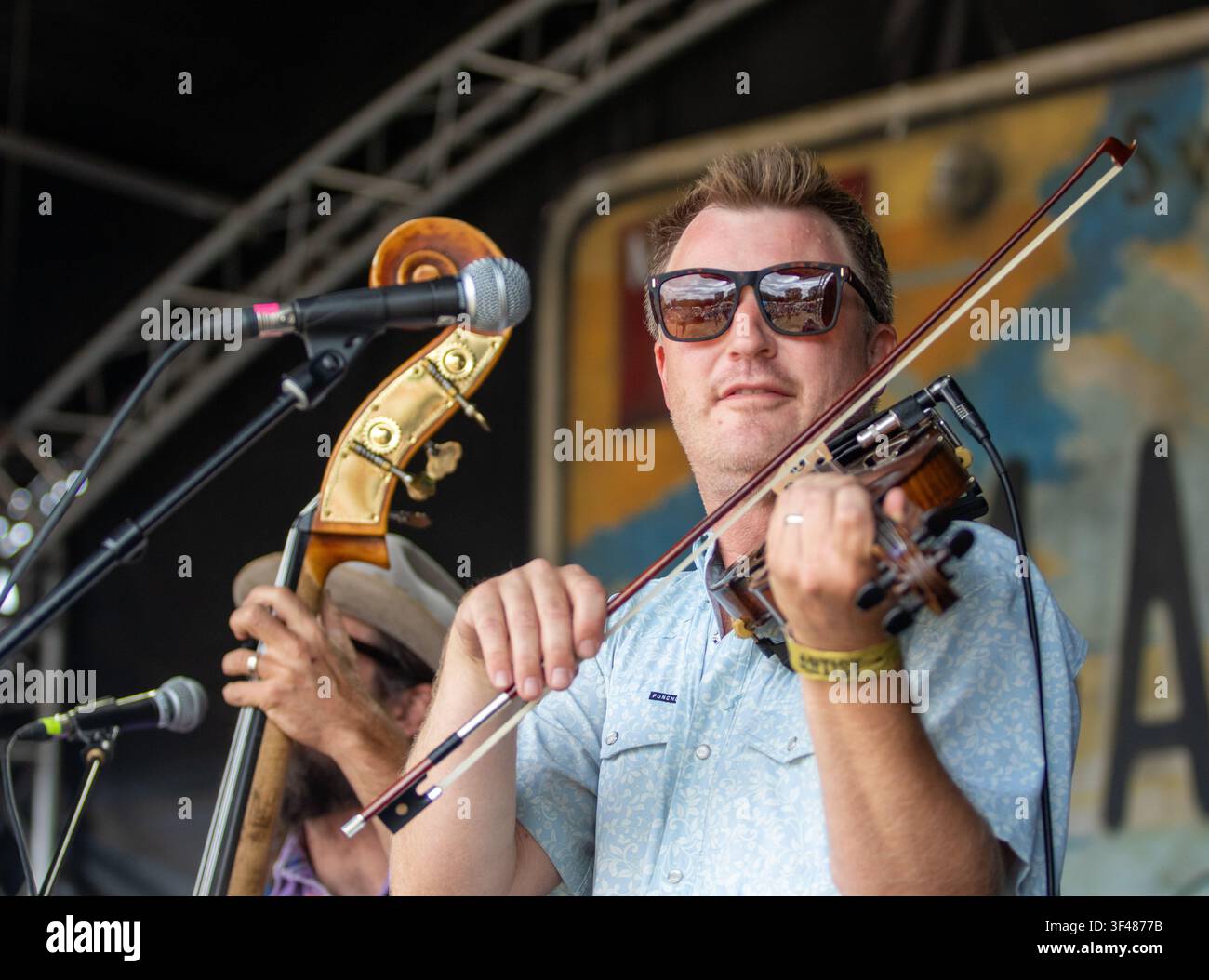 LA band Rose's Pawnshop prompting dancing at the 19th Maverick long weekend Americana music festival held in Easton Farm Park in rural Suffolk. Stock Photo