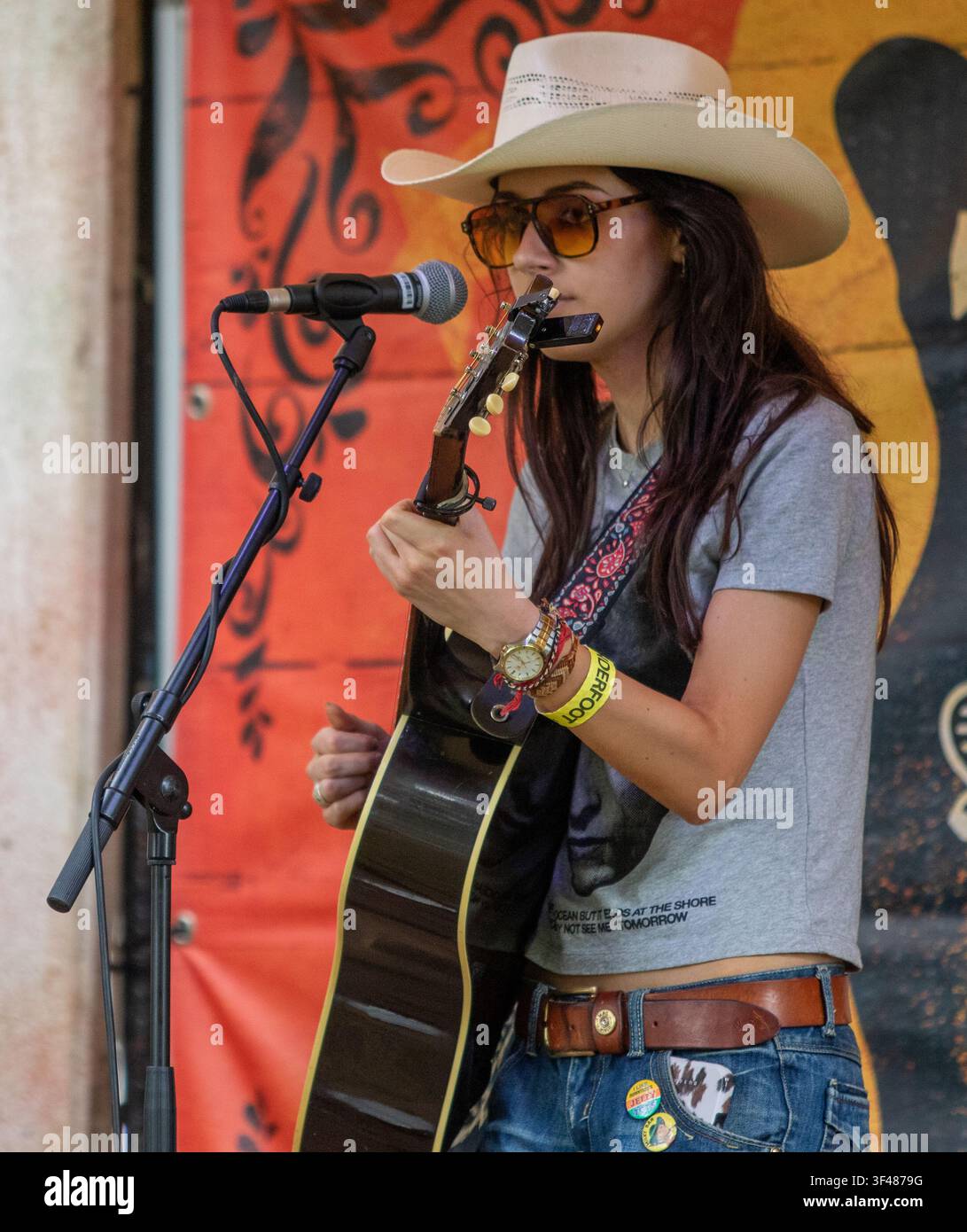 On the Medicine Show busker stage Florence at the 19th Maverick long weekend Americana music festival held in Easton Farm Park in rural Suffolk. Stock Photo