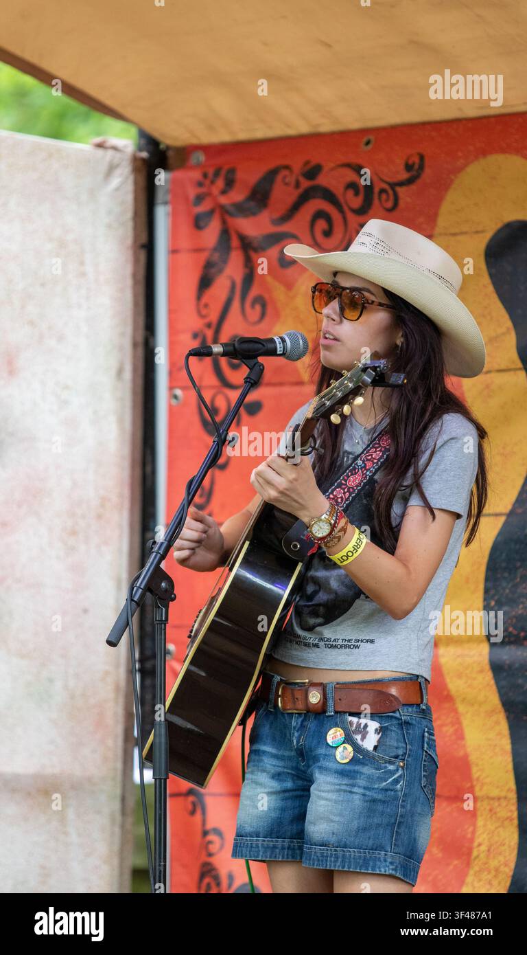 On the Medicine Show busker stage Florence at the 19th Maverick long weekend Americana music festival held in Easton Farm Park in rural Suffolk. Stock Photo