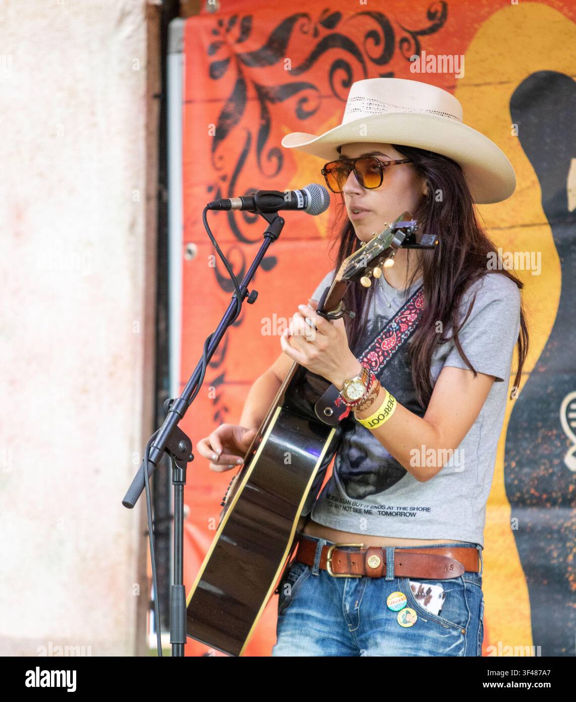 On the Medicine Show busker stage Florence at the 19th Maverick long weekend Americana music festival held in Easton Farm Park in rural Suffolk. Stock Photo