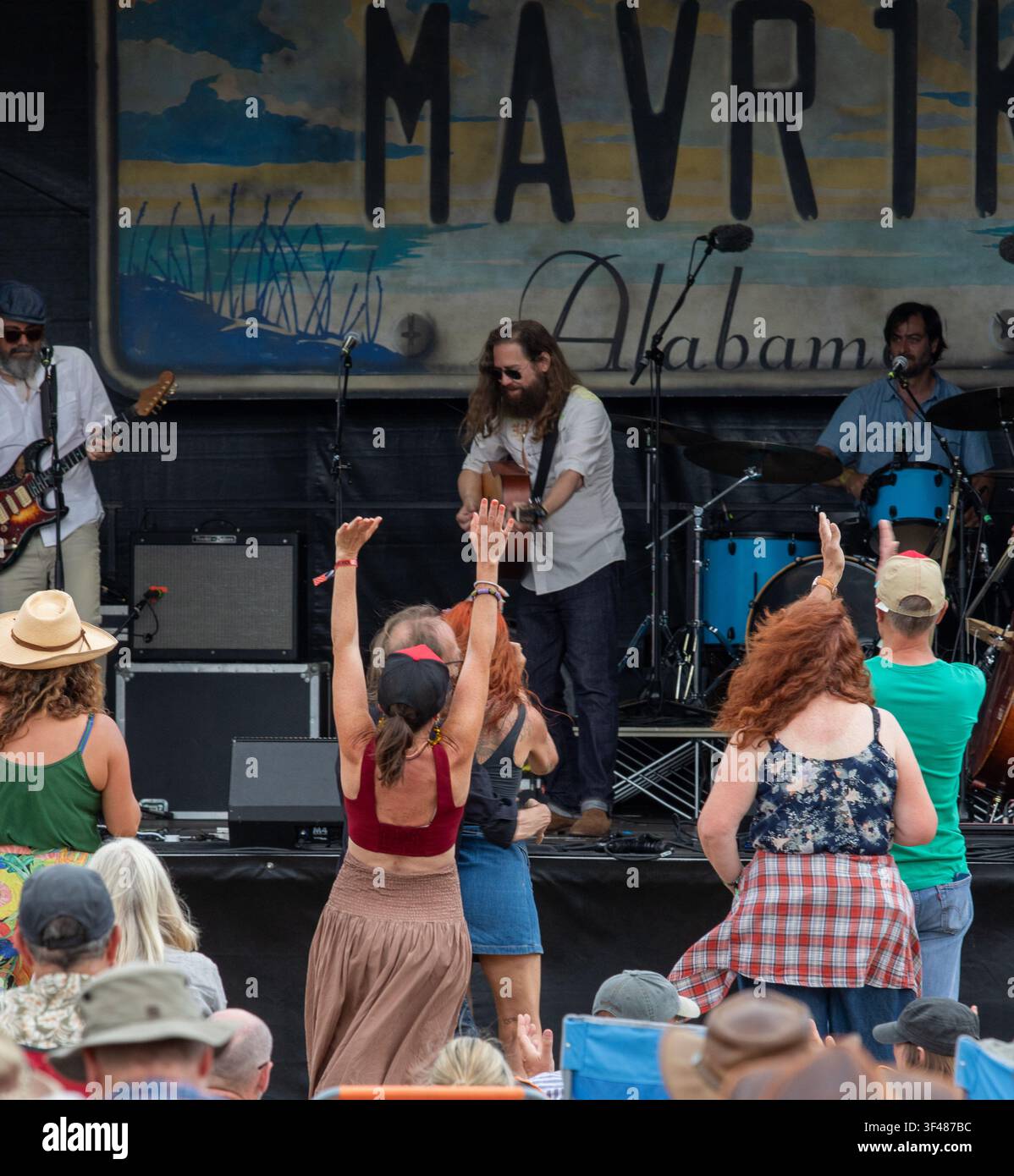LA band Rose's Pawnshop prompting dancing at the 19th Maverick long weekend Americana music festival held in Easton Farm Park in rural Suffolk. Stock Photo