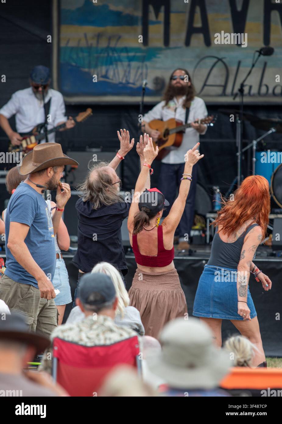 LA band Rose's Pawnshop prompting dancing at the 19th Maverick long weekend Americana music festival held in Easton Farm Park in rural Suffolk. Stock Photo