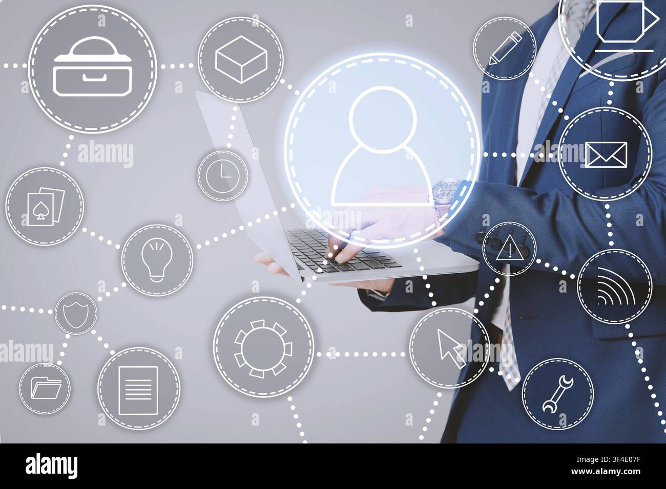 Modern technologies concept. Collage with man using laptop and different functional icons on imaginary screen, closeup Stock Photo
