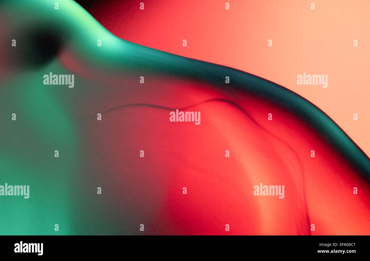 Abstract colorful liquid mixing in fluid art creating a vibrant macro background Stock Photo