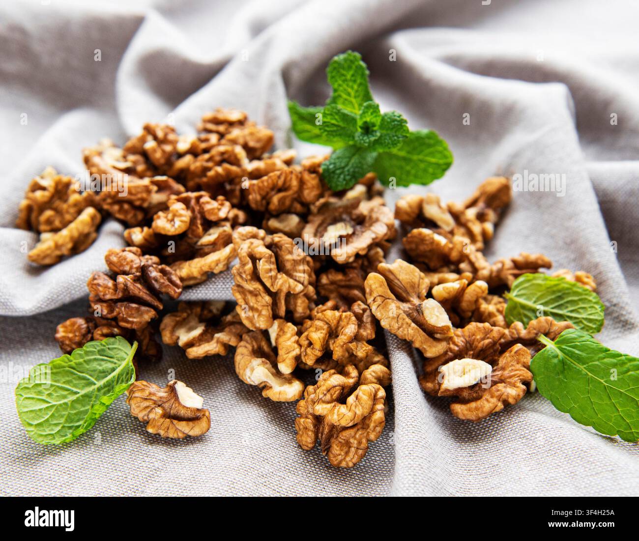 Walnuts without shell on a concrete background Stock Photo