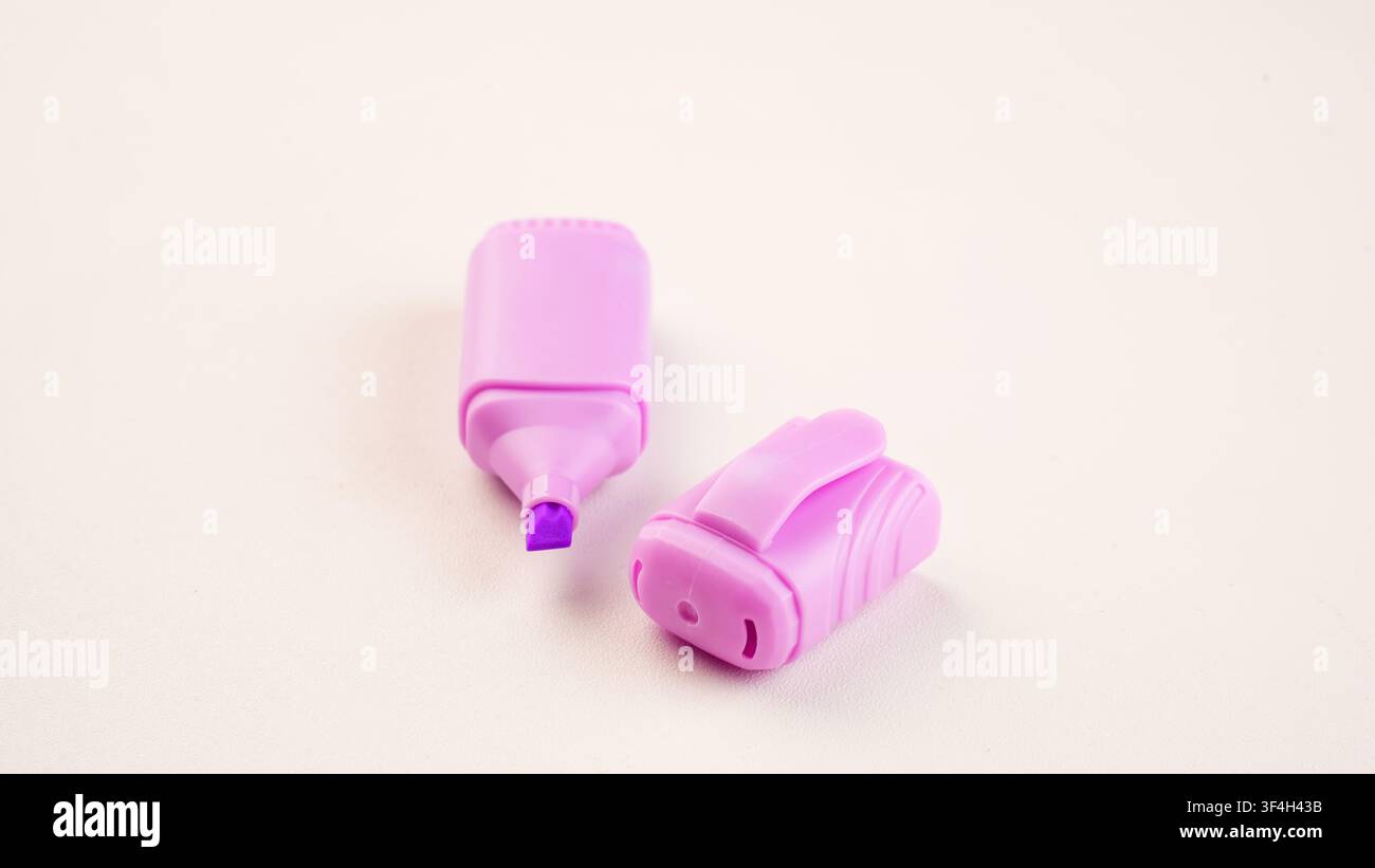 Purple Highlighter Pen on White Background Stock Photo