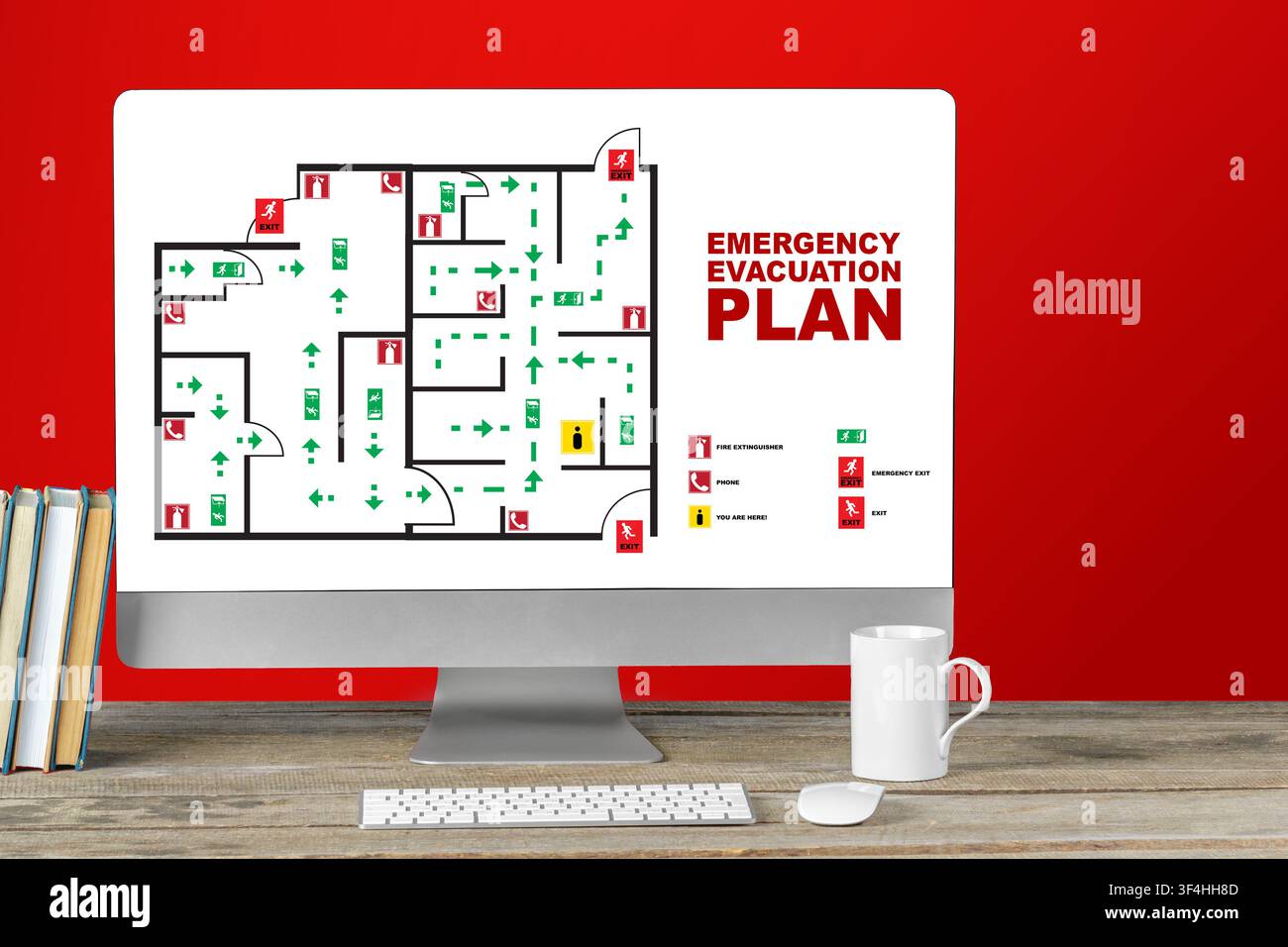 Emergency evacuation plan displayed on a computer screen in an office setting Stock Photo