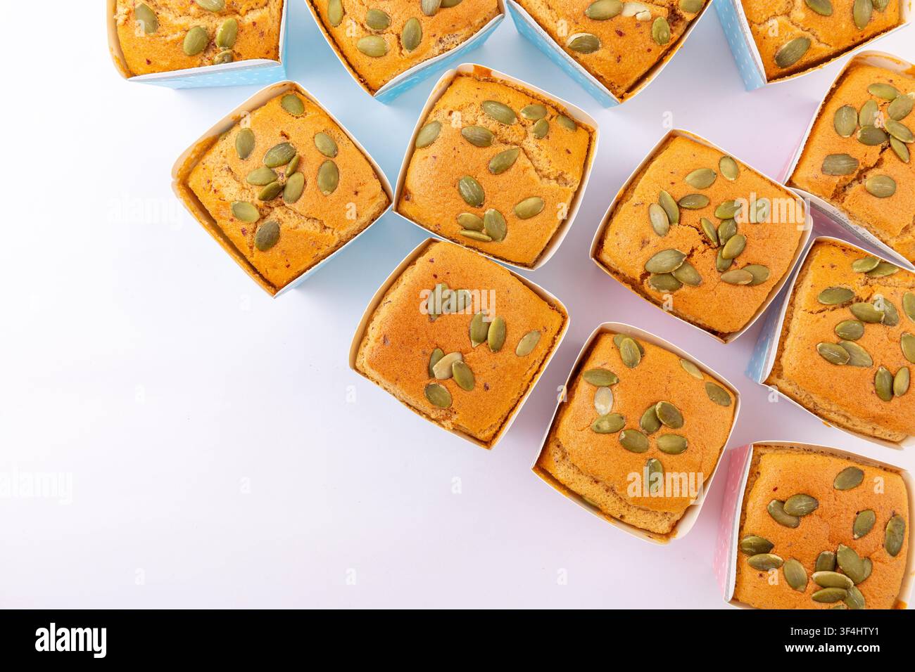 Date Nut Cupcakes Topped with Pumpkin Seeds Stock Photo