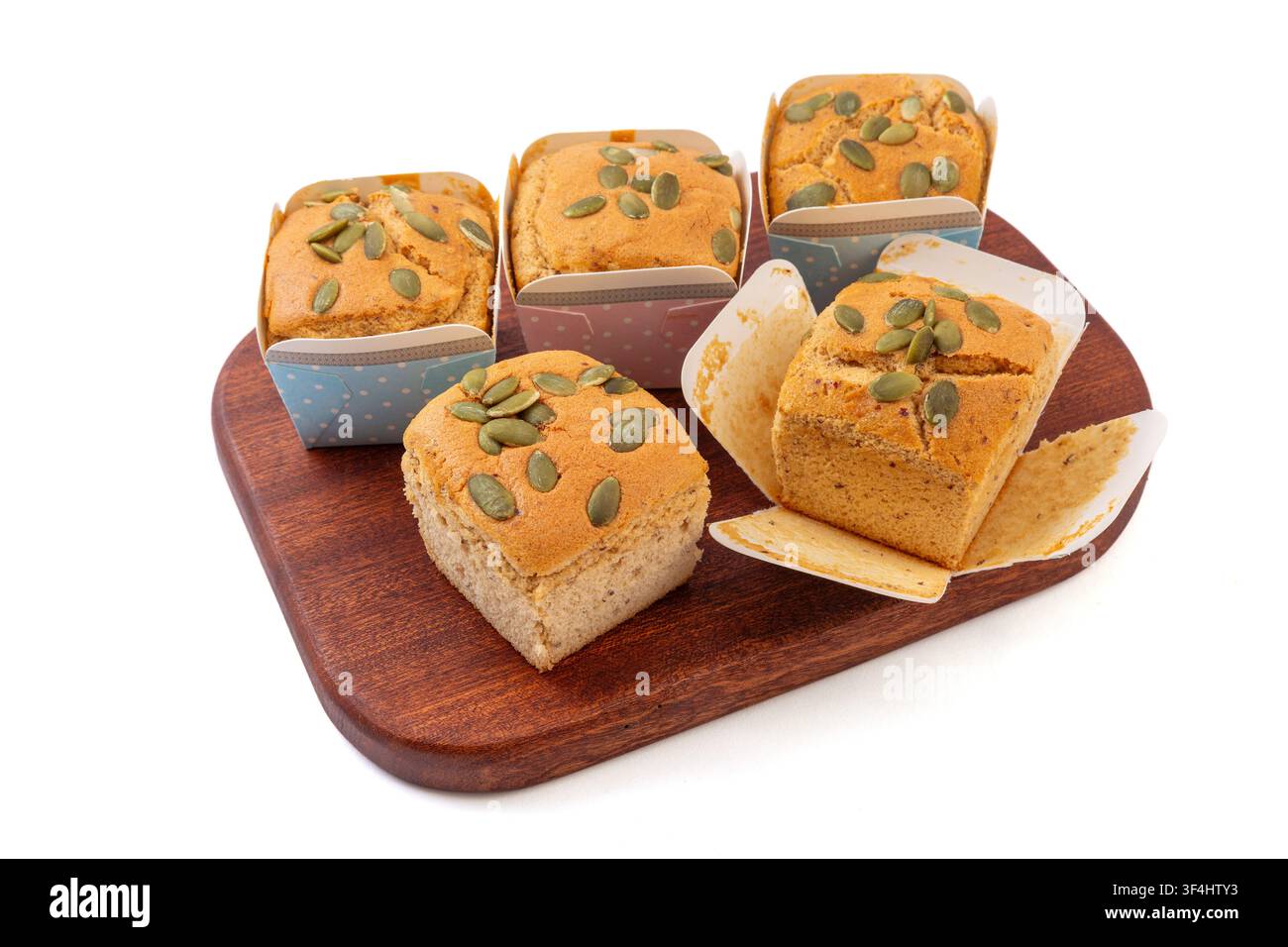 Date Nut Cupcakes Topped with Pumpkin Seeds Stock Photo