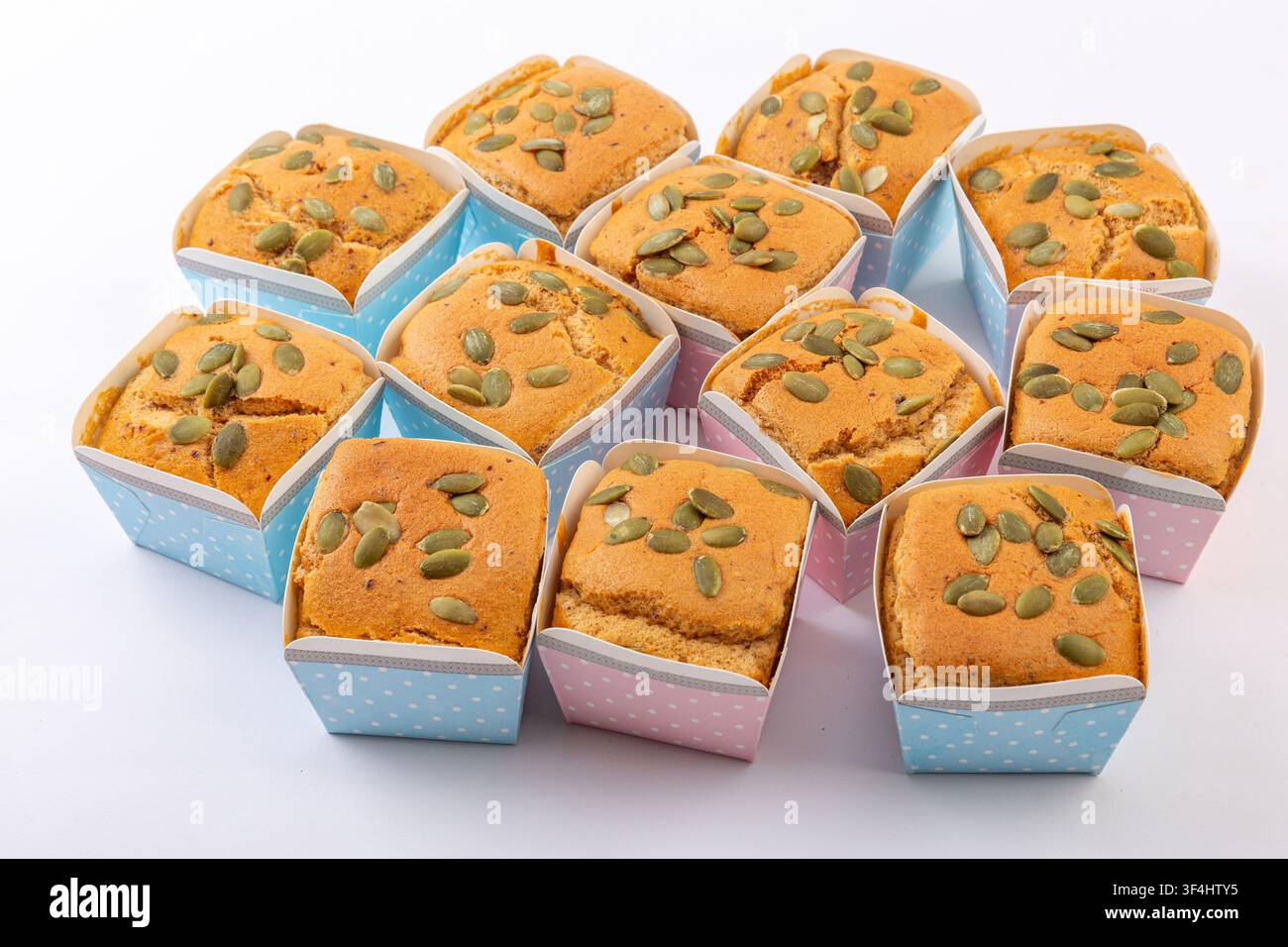 Date Nut Cupcakes Topped with Pumpkin Seeds Stock Photo