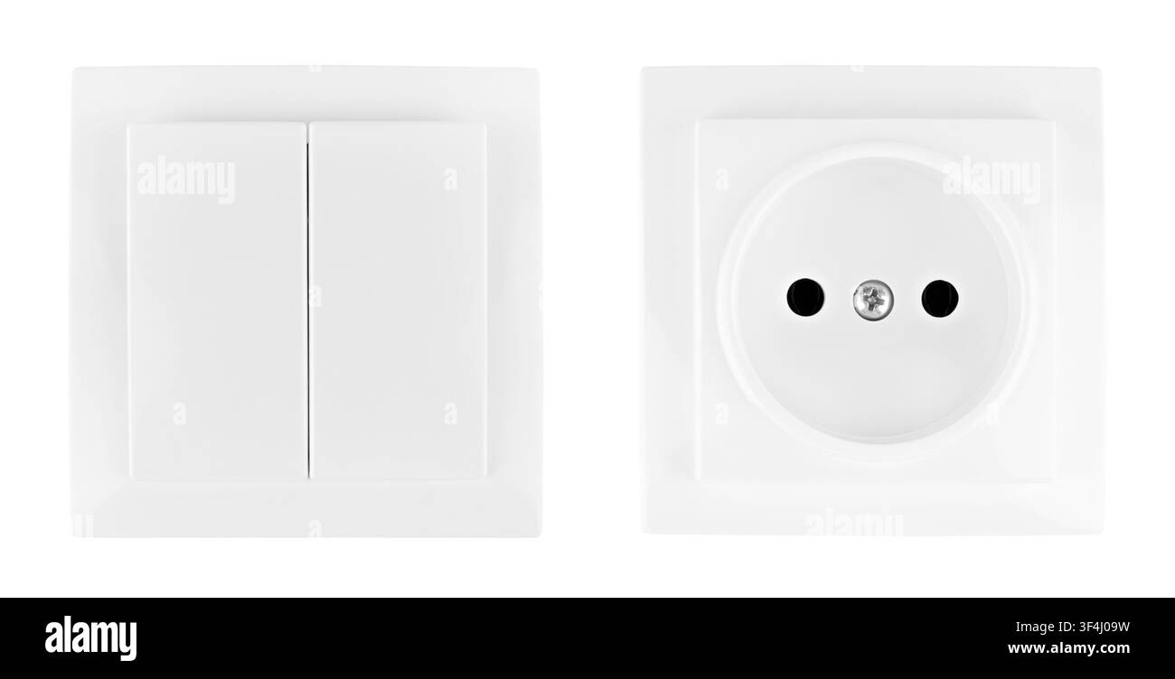 White double light switch and power outlet socket set isolated on white background. Stock Photo