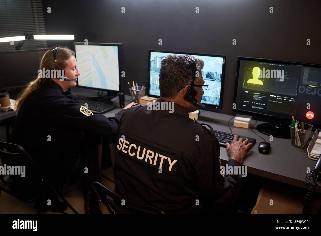 Security Team Monitoring Surveillance Data Stock Photo