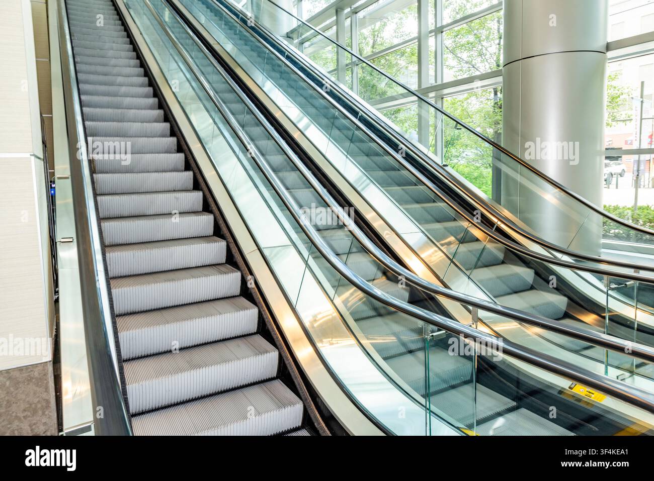 Empty escalators in modern building Stock Photo