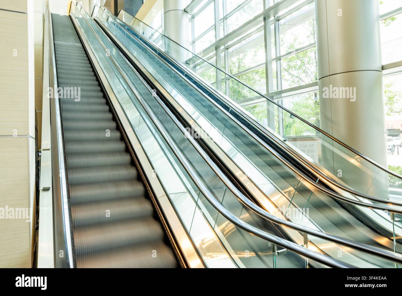Empty escalators in modern building Stock Photo