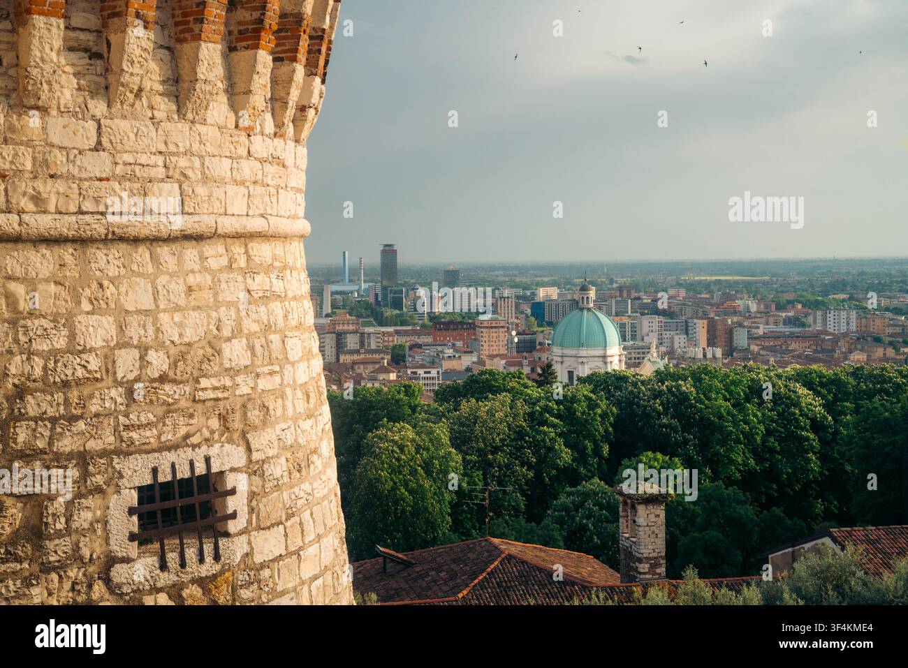 Aerial panoramic view over Brescia at sunset, Lombardy, Italy Stock Photo