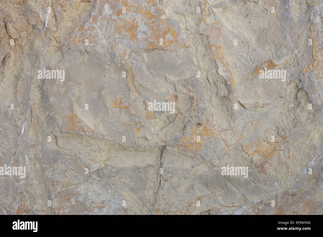 Rough Natural Stone Wall Texture With Warm Earth Tones Stock Photo