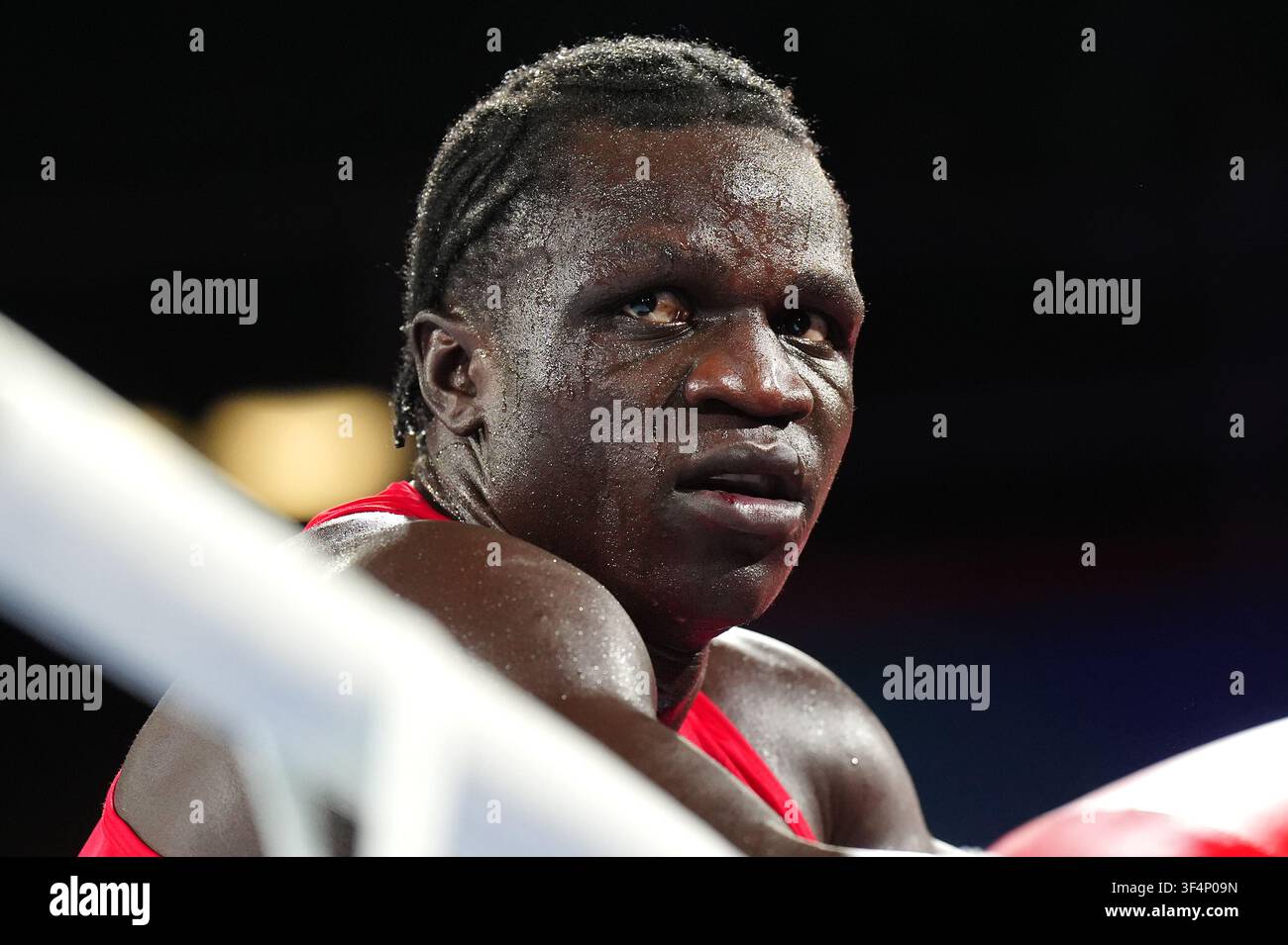 Aziz Abdul of Uganda looks on after disqualification in the Men's 90+kg ...