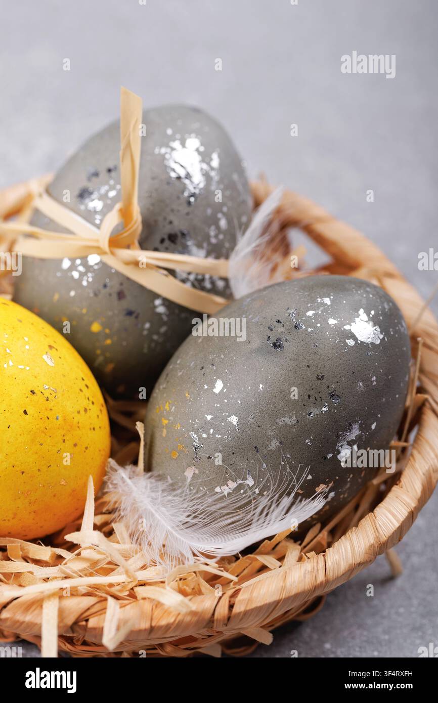 Easter greeting card eggs in nest close up Stock Photo