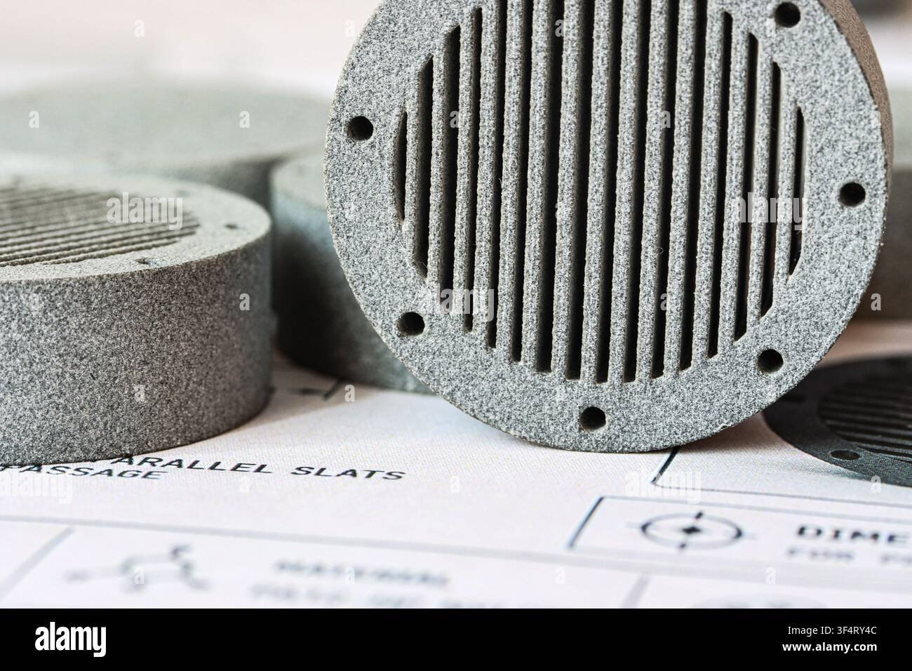 Gray MJF 3D Printed Prototype on Technical Drawing Stock Photo