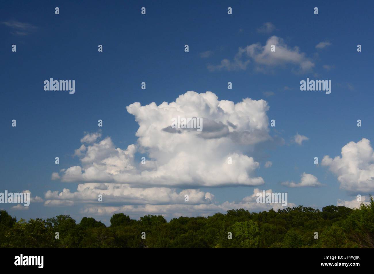 Cumulus Clouds over central Oklahoma cross timbers Stock Photo
