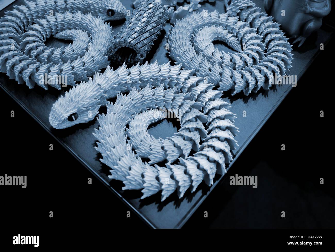 Art models printed on 3D printer. Different objects created on 3D printer from molten plastic. 3D printed different objects. Modern new modern additive progressive technologies. 3D printing technology Stock Photo