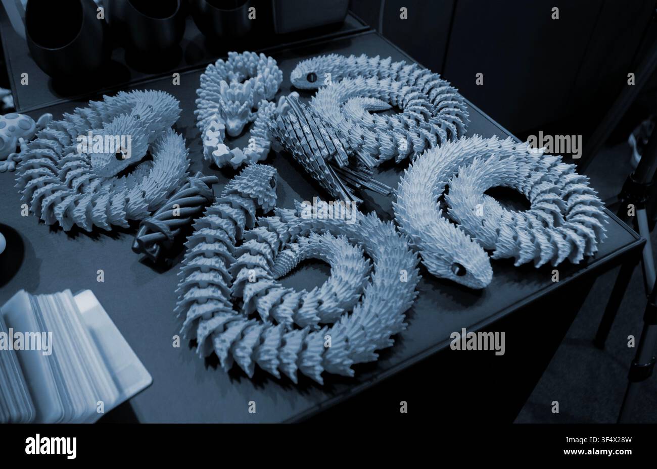 Art models printed on 3D printer. Different objects created on 3D printer from molten plastic. 3D printed different objects. Modern new modern additive progressive technologies. 3D printing technology Stock Photo