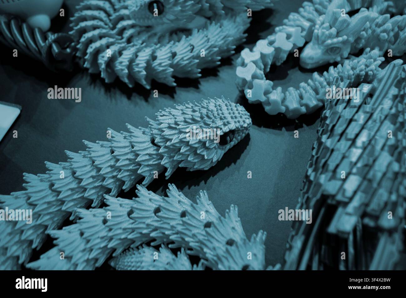 Art models printed on 3D printer. Different objects created on 3D printer from molten plastic. 3D printed different objects. Modern new modern additive progressive technologies. 3D printing technology Stock Photo