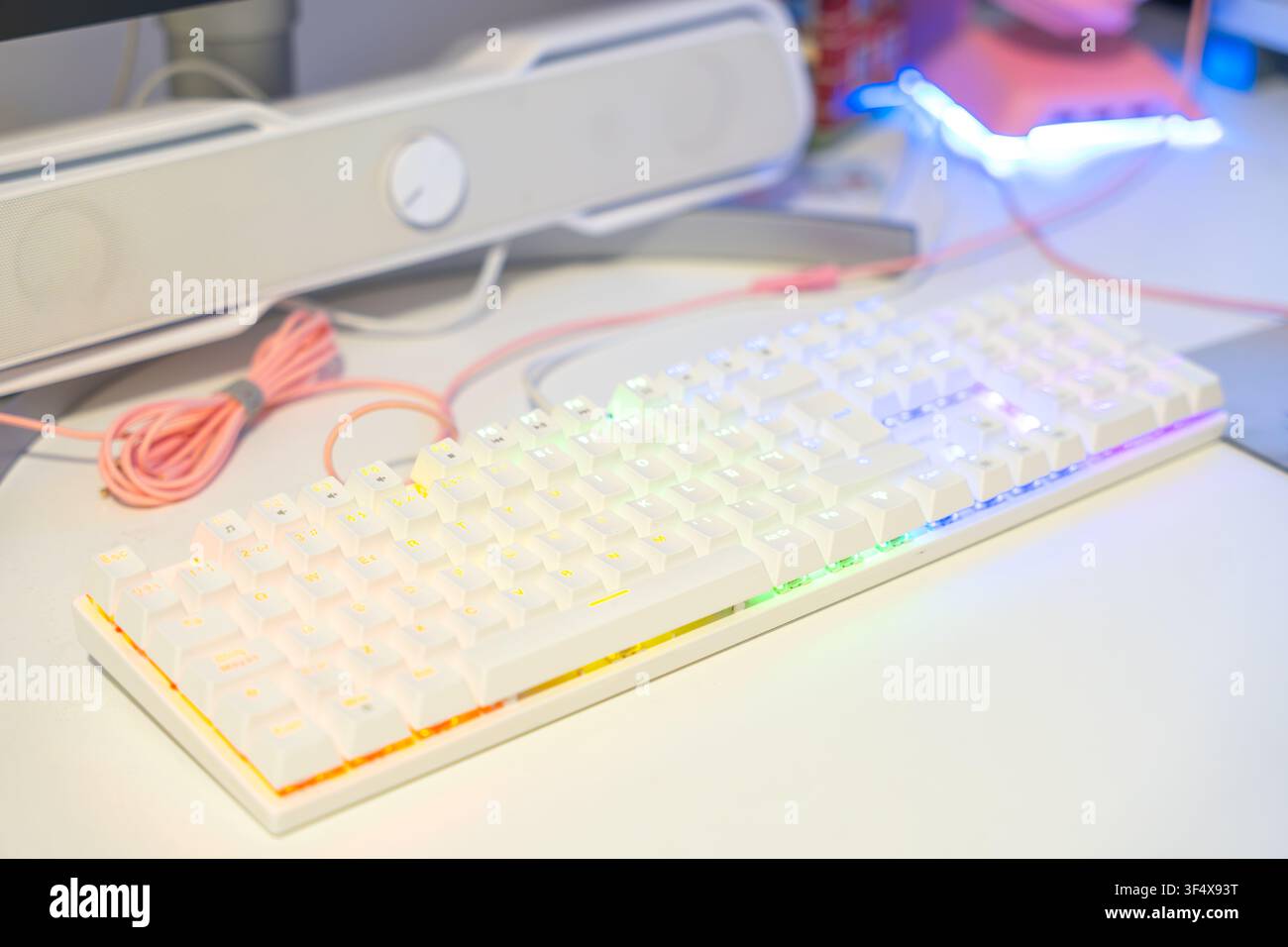 Computer keyboard with colorful backlighting creating a modern tech setup for work or play Stock Photo
