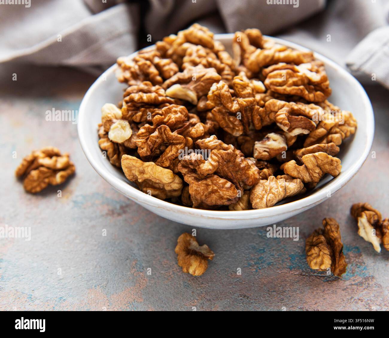 Walnuts without shell on a concrete background Stock Photo