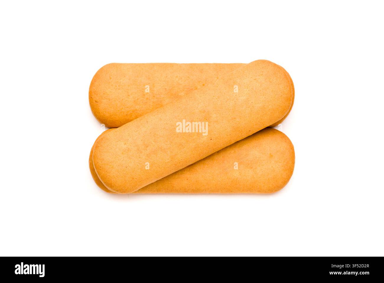 Three overlapping golden rectangular crackers isolated on clean white background Stock Photo