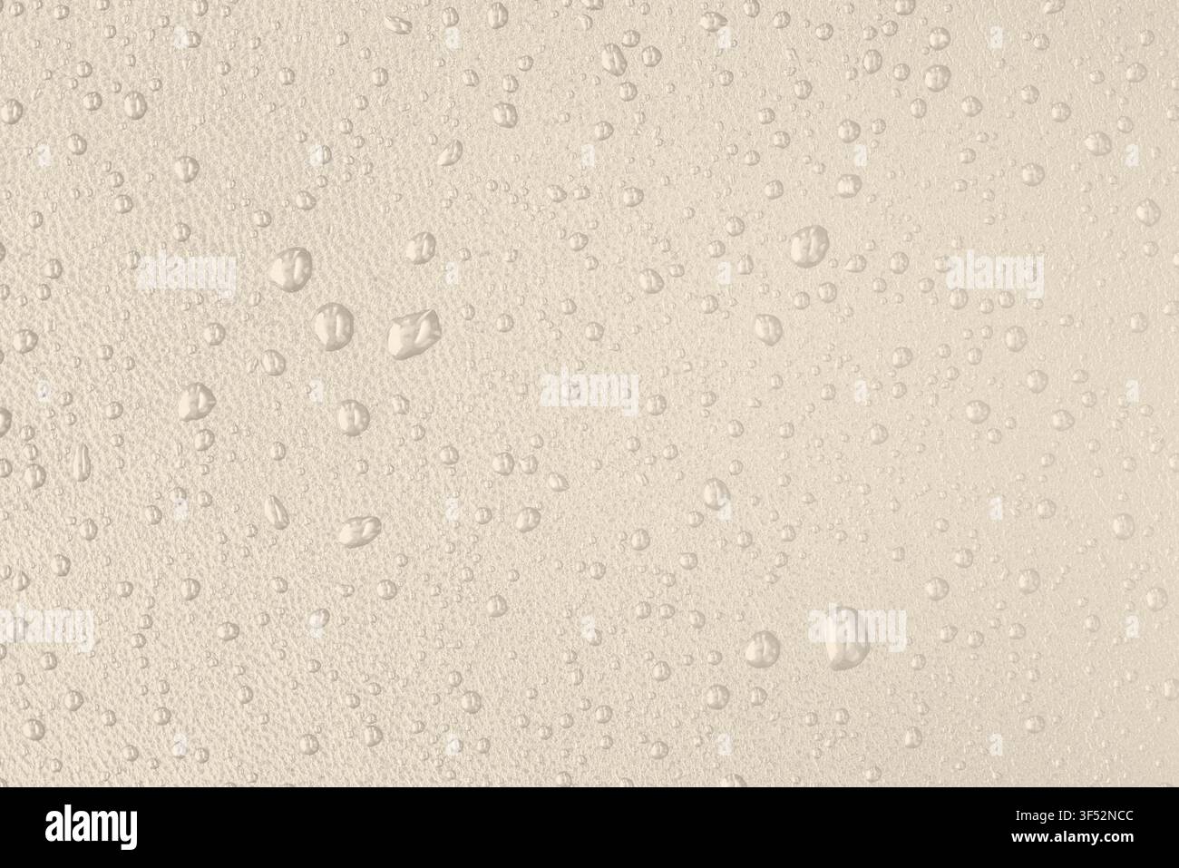 Macro leather texture with water drops, waterproof and hydrophobic surface concept, classical warm beige background Stock Photo