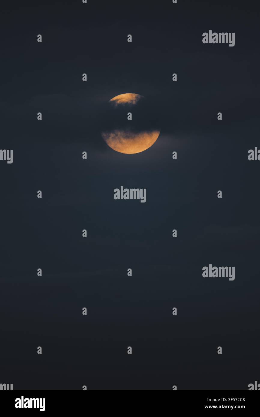 Clouds cover moon partially hi-res stock photography and images - Alamy