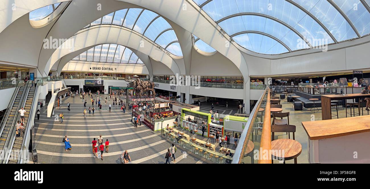 Wide view across Grand Central Birmingham above New Street station, with retail, leisure, restaurants and the sweeping atrium ETFE roof Stock Photo
