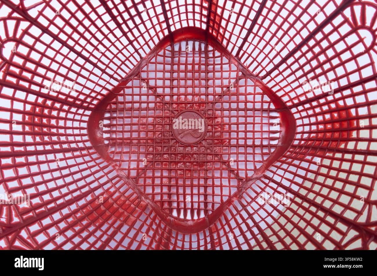 Red Plastic Basket Geometric Pattern Background, suitable for abstract background, texture, container detail Stock Photo
