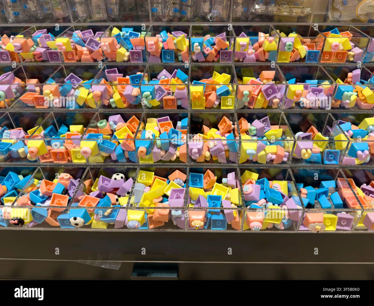 Colorful Mechanical Keyboard Keycaps Display in Organizer Tray for Custom Keyboard DIY Stock Photo