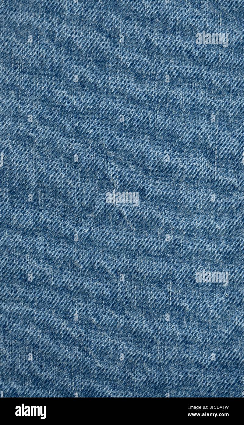 Blue denim fabric showing a detailed textile texture Stock Photo