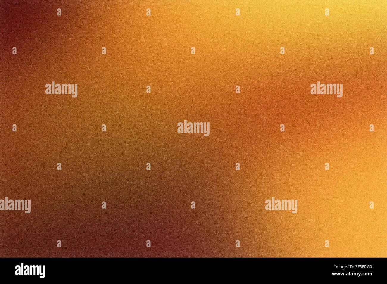 Grainy orange to yellow color gradient creating warm abstract background Stock Photo